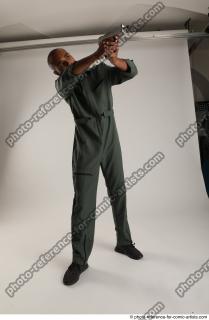 16 2018 01 ERIC IN ACTION WITH GUN